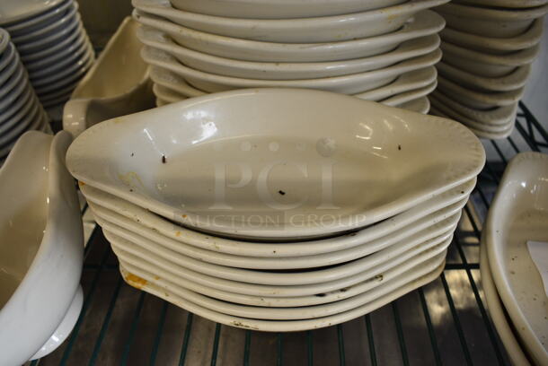 21 White Ceramic Single Serving Casserole Dishes. 9x4.5x1. 21 Times Your Bid!