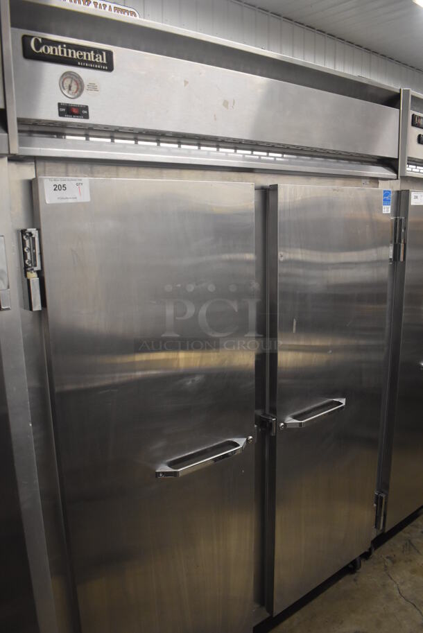 Continental 2RE ENERGY STAR Stainless Steel Commercial 2 Door Reach In Cooler on Commercial Casters. 115 Volts, 1 Phase. 57x34x82. Tested and Powers On But Does Not Get Cold - Image 1 of 6