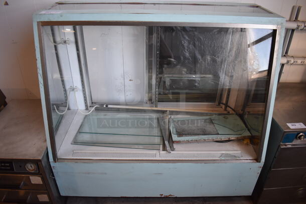 Floor Style Dry Display Case Merchandiser. 48x24x48. Tested and Powers On But Does Not Get Cold