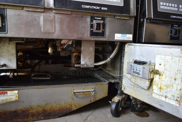 2016 Henny Penny OGA-323 ENERGY STAR Stainless Steel Commercial Natural Gas Powered 3 Bay Fryer w/ 4 Metal Fry Baskets on Commercial Casters. 255,000 BTU.  - Image 9 of 12