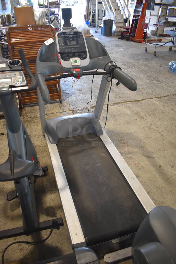 Precor 946i Metal Commercial Treadmill. 120 Volts, 1 Phase. 34x79x68. Powers On But Parts Do Not Move