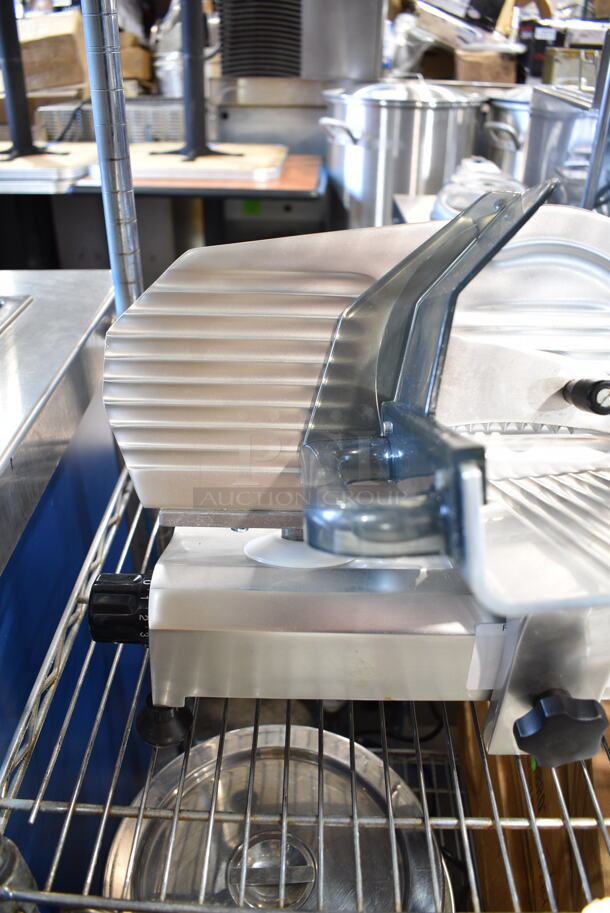 Omcan 195F Stainless Steel Commercial Countertop Meat Slicer. 115 Volts, 1 Phase. Tested and Working!  - Image 3 of 6