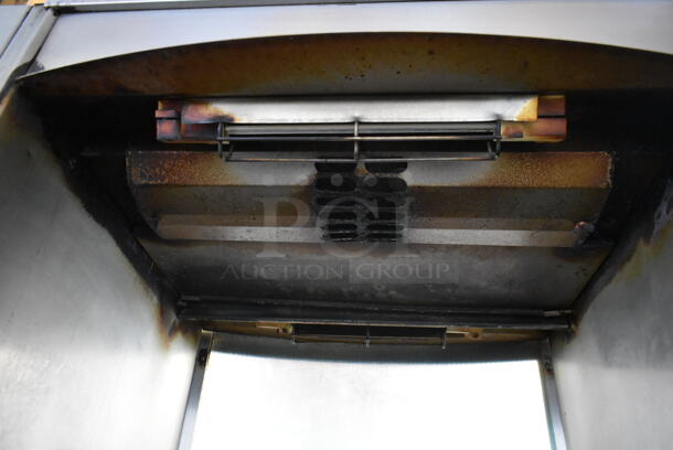 Fri-jado STG7-P Stainless Steel Commercial Electric Powered Rotisserie Oven w/ Under Shelf on Commercial Casters. 208 Volts, 3 Phase.
 - Image 6 of 9