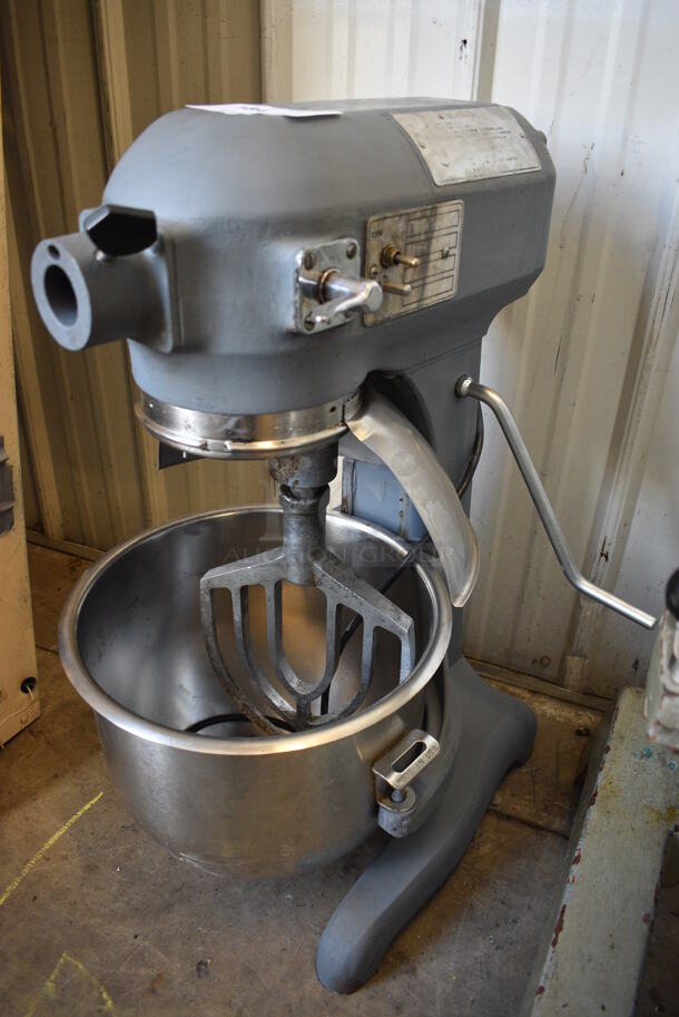Hobart A-200 Metal Commercial Floor Style 20 Quart Planetary Dough Mixer w/ Stainless Steel Mixing Bowl and Paddle Attachment. 115 Volts, 1 Phase. 16x21x31. Powers On But Parts Do Not Move
