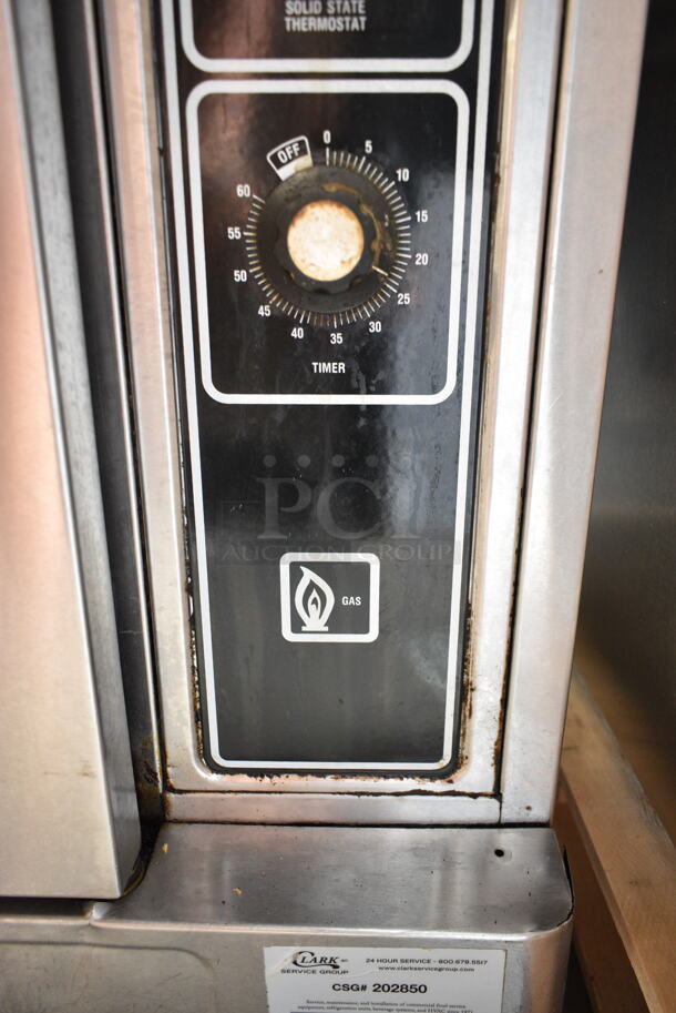 Blodgett Stainless Steel Commercial Natural Gas Powered Half Size Convection Oven w/ View Through Door, Metal Oven Racks, Thermostatic Controls and Equipment Stand on Commercial Casters. Missing 1 Caster. - Image 7 of 11