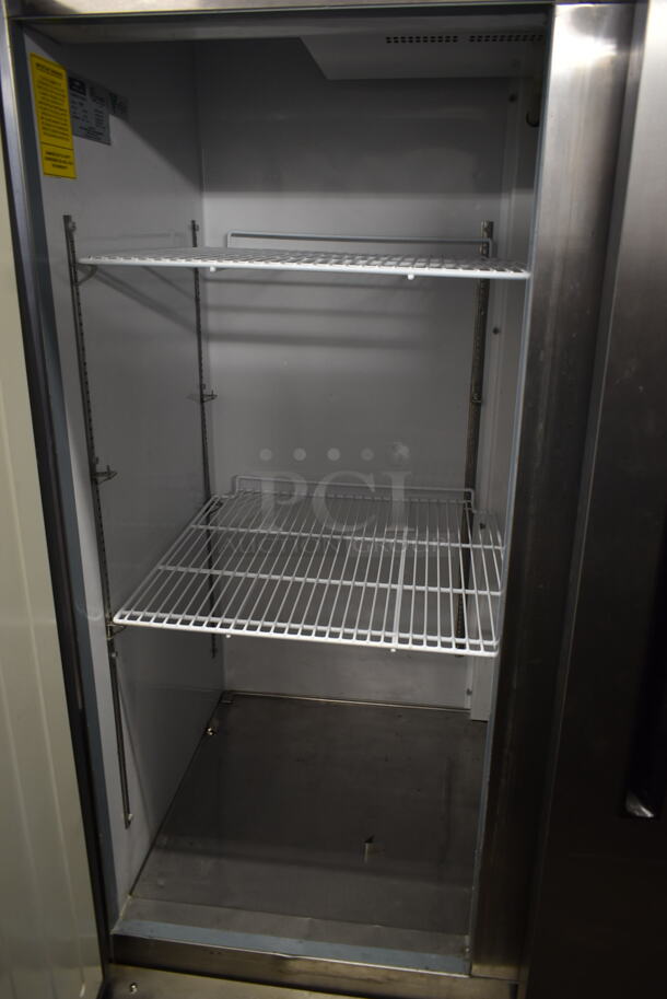 Arctic Air AF49 Stainless Steel Commercial Double Door Reach In Freezer w/ Poly Coated Racks on Commercial Casters. 115 Volts, 1 Phase. Tested and Working! - Image 5 of 7