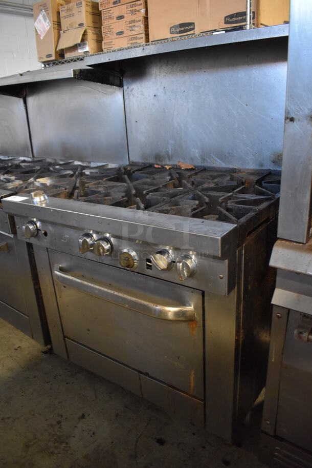 Southbend Stainless Steel Commercial Natural Gas Powered 6 Burner Range w/ Oven, Over Shelf and Back Splash. 36.5x34x59