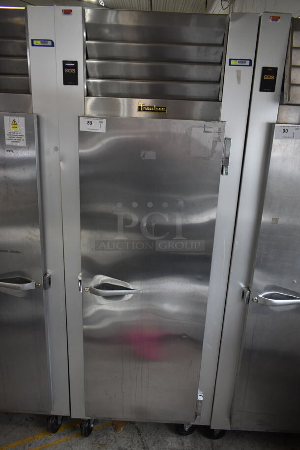 Traulsen G12010 ENERGY STAR Stainless Steel Commercial Single Door Reach In Freezer w/ Poly Coated Racks on Commercial Casters. 115 Volts, 1 Phase. Tested and Working!