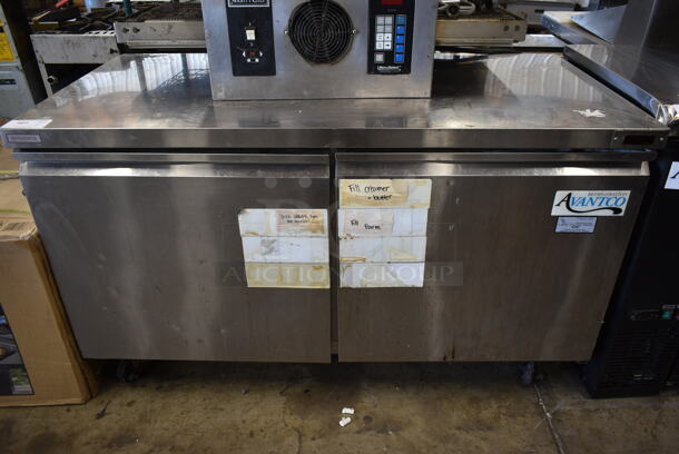 Avantco 178TUC60R Stainless Steel Commercial 2 Door Undercounter Cooler on Commercial Casters. 115 Volts, 1 Phase. Tested and Powers On But Does Not Get Cold
 - Image 1 of 8