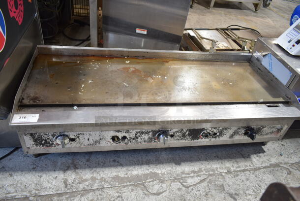 Vollrath FTG9060 Stainless Steel Commercial Countertop Natural Gas Powered Flat Top Griddle. 140,000 BTU. 