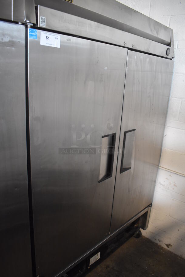 2013 True T-49F ENERGY STAR Stainless Steel Commercial 2 Door Reach In Freezer w/ Poly Coated Racks on Commercial Casters. 115 Volts, 1 Phase. Tested and Working!