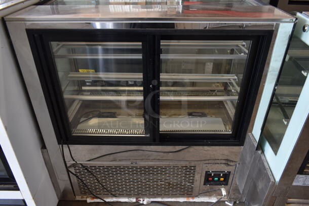 Stainless Steel Commercial Floor Style Deli Display Case Merchandiser. See Picture For Crack on Side Pane. Tested and Powers On But Does Not Get Cold - Image 3 of 7