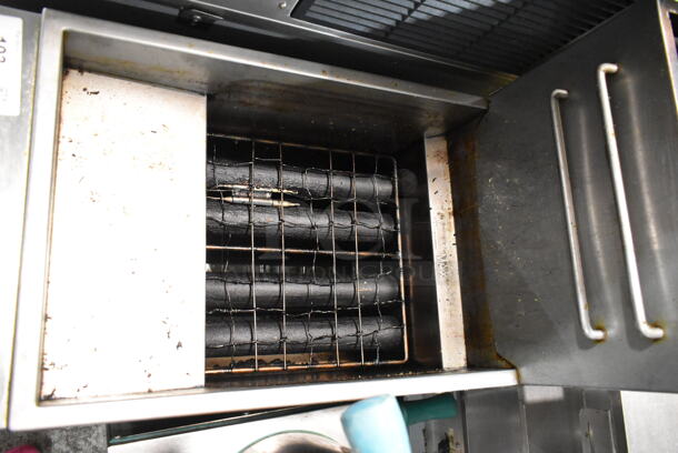 Entree F4-N Stainless Steel Commercial Floor Style Natural Gas Powered Deep Fat Fryer w/ 2 Metal Fry Baskets. 120,000 BTU.  - Image 3 of 6