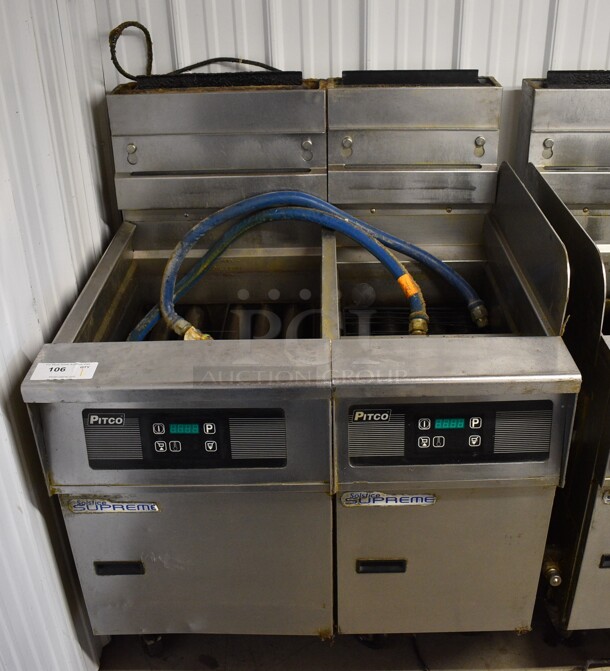 Pitco Frialator Solstice Supreme Stainless Steel Commercial Floor Style Double Bay Deep Fat Fryer w/ Right Side Splash Guard and 2 Gas Hoses on Commercial Casters. 35.5x35x47