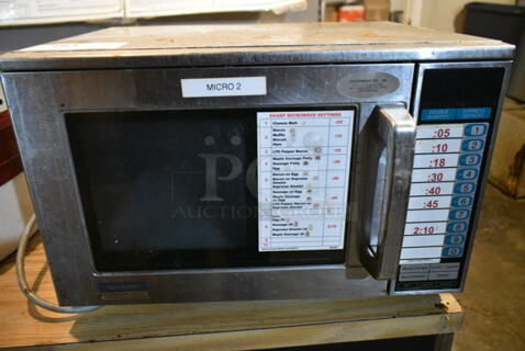 Sharp R-23GT Stainless Steel Commercial Countertop Microwave Oven. 120 Volts, 1 Phase. This Unit Was In Working Condition When the Restaurant Closed. (basement) 