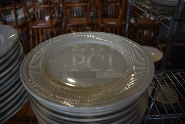 11 White Ceramic Plates. 9.5x9.5x1. 11 Times Your Bid! - Image 2 of 3