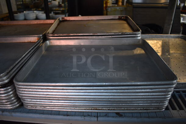 51 Metal Half Size Baking Pans. 47 Solid and 4 Perforated. 13x18x1. 51 Times Your Bid!