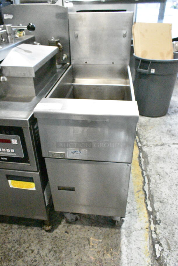 Pitco Frialator Stainless Steel Commercial Floor Style Natural Gas Powered Deep Fat Fryer on Commercial Casters. 110,000 BTU.  - Image 1 of 6