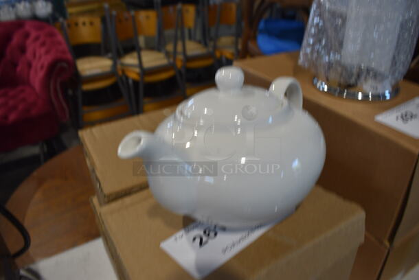 4 BRAND NEW IN BOX! White Ceramic Tea Pots. 9x5.5x5. 4 Times Your Bid! - Image 2 of 2