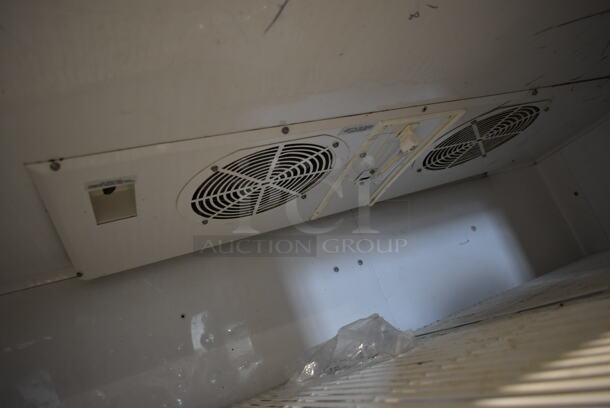 2011 True TG2R-2S Stainless Steel Commercial 2 Door Reach In Cooler w/ Poly Coated Racks on Commercial Casters. 115 Volts, 1 Phase. Tested and Working! - Image 6 of 8