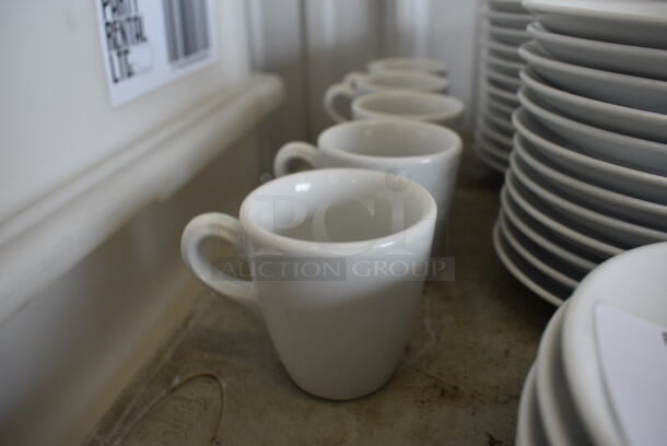 6 White Ceramic Mugs. 3x2.5x2.5. 6 Times Your Bid!
