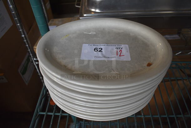 12 White Ceramic Oval Plates. 11x9x1. 12 Times Your Bid!