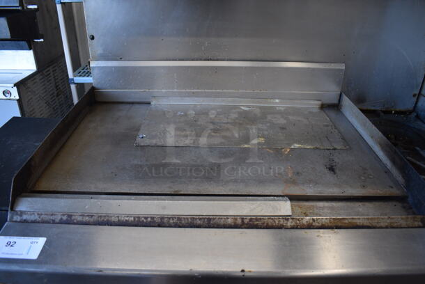 Garland Stainless Steel Commercial Natural Gas Powered Flat Top Griddle, 2 Burner Range, Oven, Over Shelf and Back Splash. 48x33x59.5 - Image 2 of 7