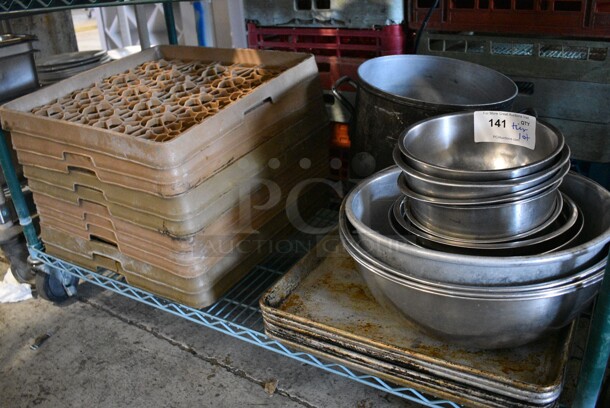 ALL ONE MONEY! Tier Lot of Approximately 6 Full Size Metal Baking Pans, 11 Metal Bowls, Stock Pot and 10 Dish Racks. Includes 18x26x1