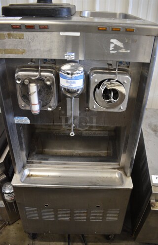 Taylor 342D-27 Stainless Steel Commercial Floor Style Air Cooled 2 Flavor Frozen Beverage Machine w/ Drink Mixer Attachment on Commercial Casters. 208-230 Volts, 1 Phase. 26x34x60