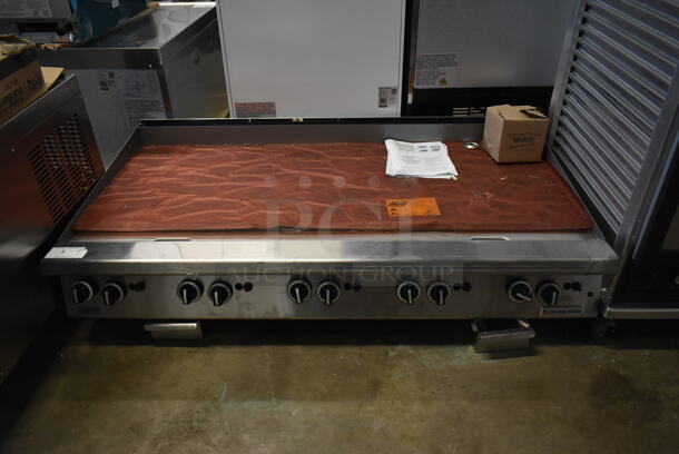 BRAND NEW SCRATCH AND DENT! 2023 Garland Stainless Steel Commercial Countertop Natural Gas Powered Flat Top Griddle.