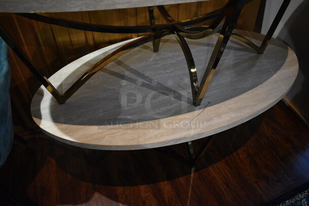 2 Oval Wood Pattern Coffee Tables on Metal Legs. 48x28x18. 2 Times Your Bid! (lounge) - Image 3 of 4