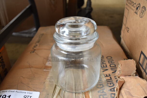 12 BRAND NEW IN BOX! Glass Jars. 4x4x5.5. 12 Times Your Bid!