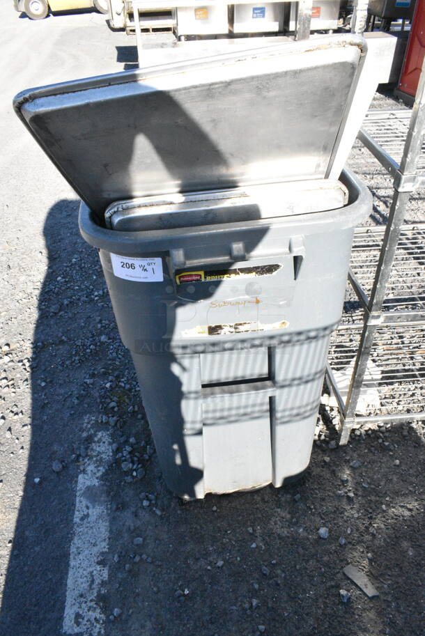 Rubbermaid Gray Poly Trash Can w/ Contents Including Metal Baking Pans.  - Image 1 of 4