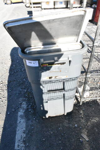 Rubbermaid Gray Poly Trash Can w/ Contents Including Metal Baking Pans. 