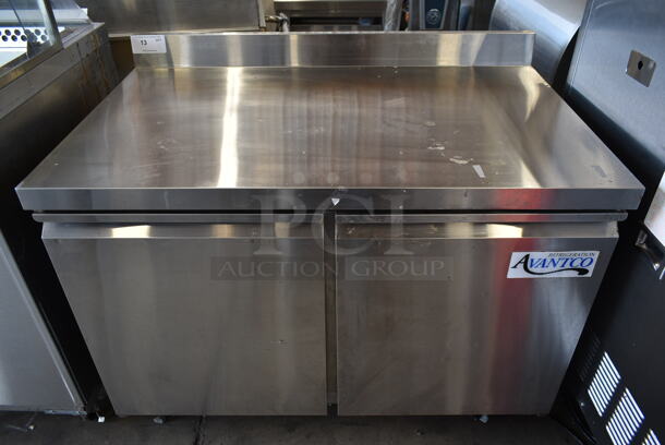 Avantco 178SSWT48FHC Stainless Steel  Commercial 2 Door Work Top Freezer w/ Back Splash on Commercial Casters. 115 Volts, 1 Phase. Tested and Working!