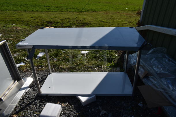 BRAND NEW SCRATCH AND DENT! Stainless Steel Commercial Table w/ Under Shelf. - Image 1 of 4