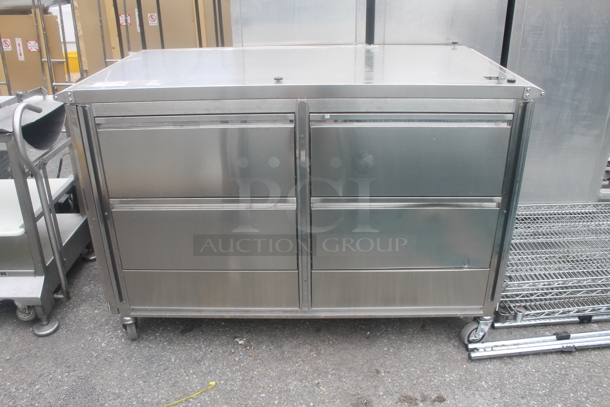 Stainless Steel Commercial Counter w/ 4 Doors on Commercial Casters. - Image 1 of 4
