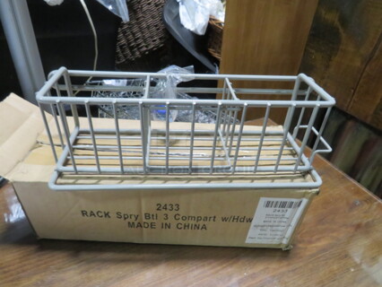 One NEW 3 Compartment Spray Bottle Rack.