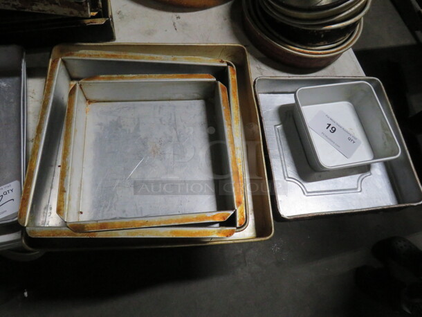 One Mega Lot Of Assorted Size Square Cake Pans.