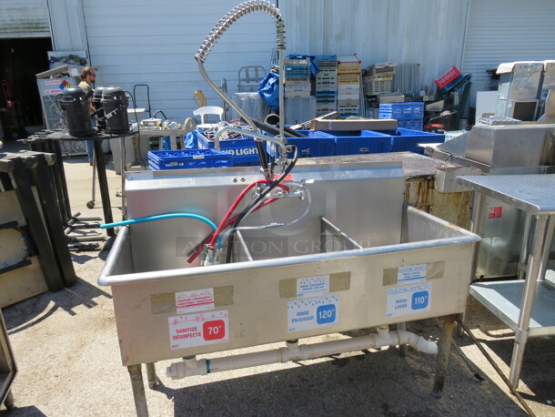 One Stainless Steel 3 Compartment Sink With Faucet And Hose Sprayer.  57X24X46