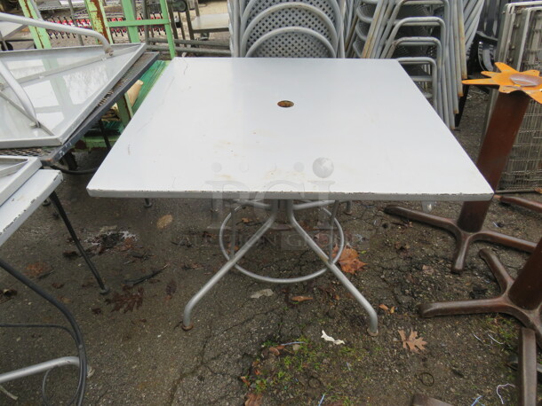 Gray Metal Patio Table With Umbrella Hole. 36X36X29