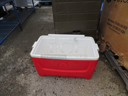 One Igloo Cooler With No Lid.