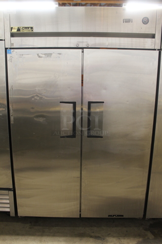 2014 True TG2R-2S ENERGY STAR Stainless Steel Commercial 2 Door Reach In Cooler w/ Poly Coated Racks on Commercial Casters. 115 Volts, 1 Phase. Tested and Working!