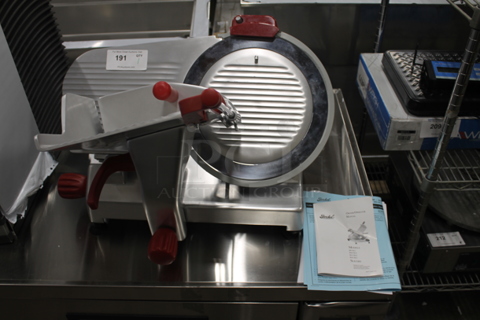 BRAND NEW SCRATCH AND DENT!  2022 Berkel B14-SLC Commercial Stainless Steel Electric Countertop Meat/Cheese Slicer On Rubber Feet. 115V, 1 Phase. Tested and Working!