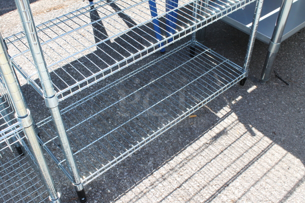 Chrome Finish 3 Tier Wire Shelving Unit. BUYER MUST DISMANTLE. PCI CANNOT DISMANTLE FOR SHIPPING. PLEASE CONSIDER FREIGHT CHARGES.
 - Image 2 of 2