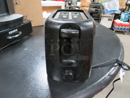 One 2 Slice Toaster. 120 Volt.