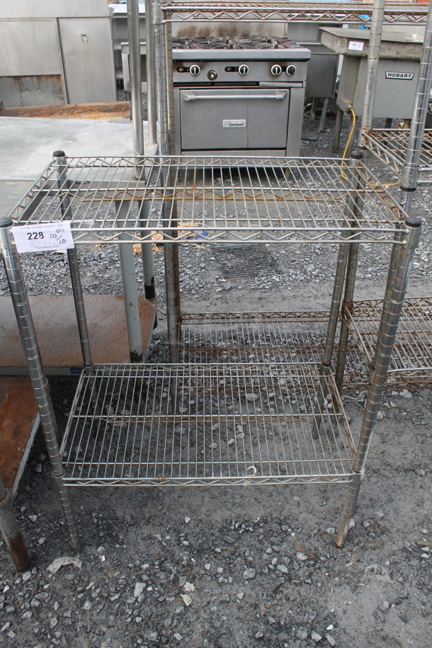 Chrome Finish 2 Tier Wire Shelving Unit. BUYER MUST DISMANTLE. PCI CANNOT DISMANTLE FOR SHIPPING. PLEASE CONSIDER FREIGHT CHARGES. - Image 1 of 2