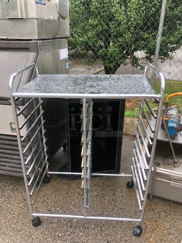 One Stainless Steel Rack On Casters. 25X15X35