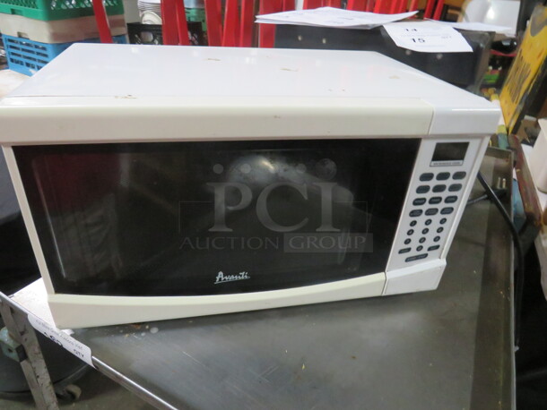 One Amana Microwave #M07191TW. 18X11X10 - Image 1 of 1