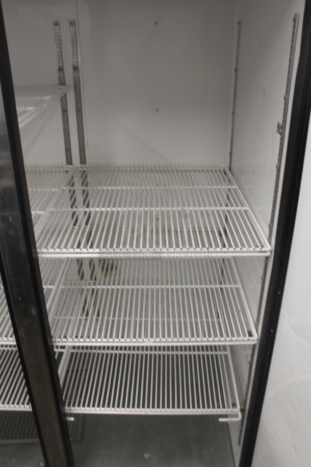 2014 True TG2R-2S ENERGY STAR Stainless Steel Commercial Two Door Reach In Cooler w/ Poly Coated Racks on Commercial Casters. 115 Volts, 1 Phase. Tested and Working! - Image 6 of 7
